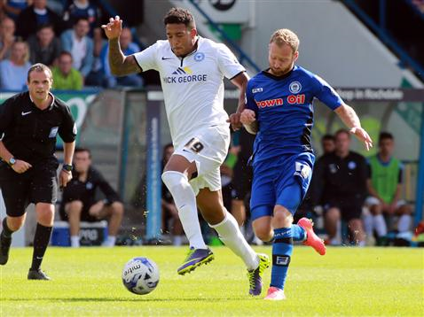 Geoff Eltringham watches Nathaniel Mendez-Laing beat his man at Rochdale