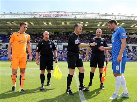 Michael Bostwick receives the coin from referee Mark Haywood v Colchester