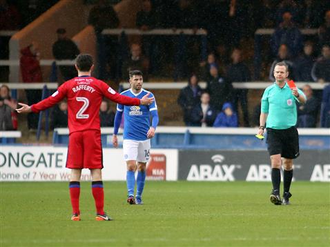 referee-chris-sarginson-shows-the-first-of-three-red-cards-posh-3-1-rochdale